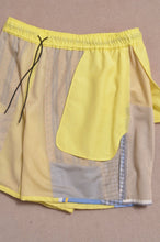 Load image into Gallery viewer, CUT AND CONNECTED C/C/L SHORTS / NEON YELLOW