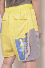 Load image into Gallery viewer, CUT AND CONNECTED C/C/L SHORTS / NEON YELLOW
